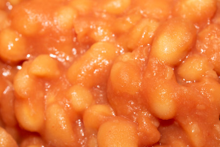 Close Up of tomato baked beans being cooked macro shotの写真素材