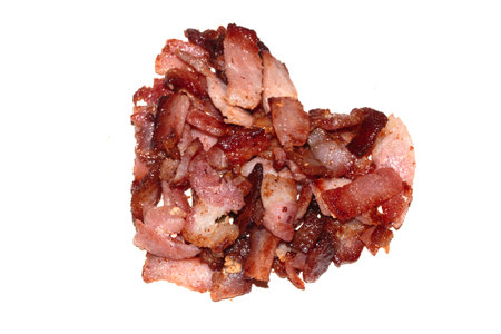 Love Heart Bacon Meat Fried Pieces Heart Disease Weird shape on White Backgroundの写真素材