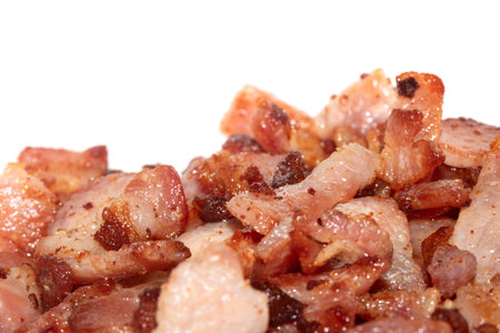 Close Up Bacon Meat Fried Pieces on White Backgroundの写真素材