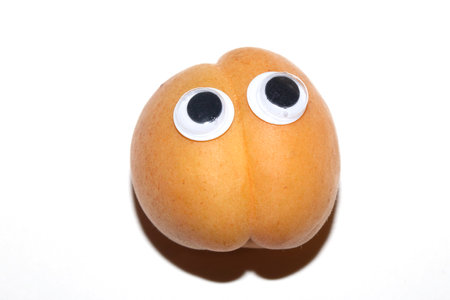 Close up of a fresh apricot fruitの写真素材