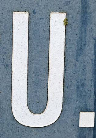 Written Wording in Distressed State Typography Found Letter U