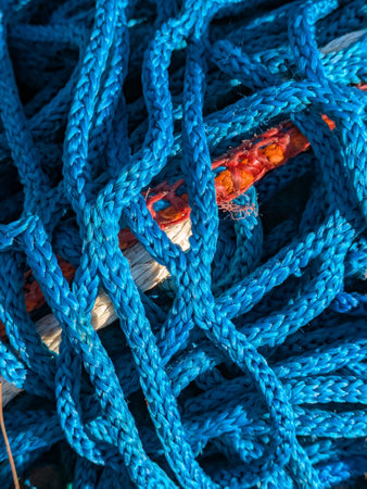 Close up of industrial blue construction rope thick and abstract