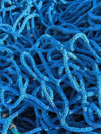 Close up of industrial blue construction rope thick and abstractの写真素材