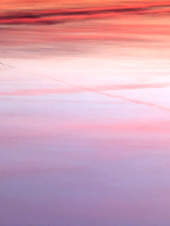 Calm Sunset Clouds In Reds and Blues Natural Background Skyscapeの写真素材