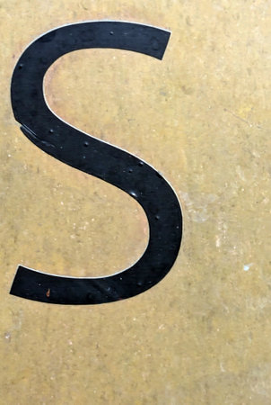 Written Wording in Distressed State Typography Found Letter S