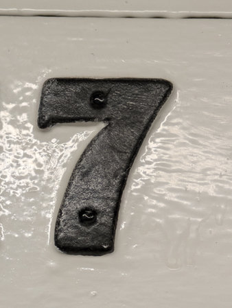 Written Wording in Distressed State Typography Found Number 7