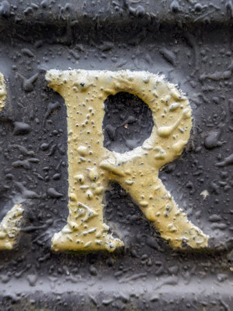 Written Wording in Distressed State Typography Found Ransom Letter R