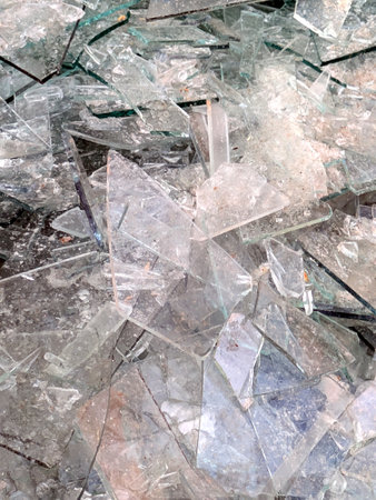 Close up of smashed glass abstract background splintered shardsの写真素材