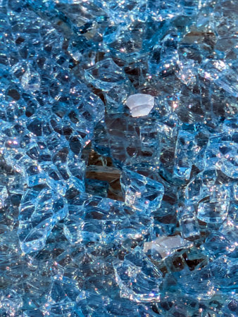 Close up of smashed glass abstract background splintered shards