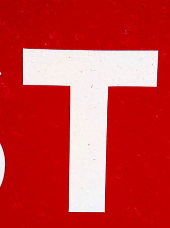 Written Wording in Distressed State Typography Found Ransom Letter T