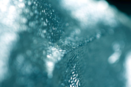 A Shiny Foil Crumpled in Sharp Crumpled Metallic Gloss Backgroundの写真素材