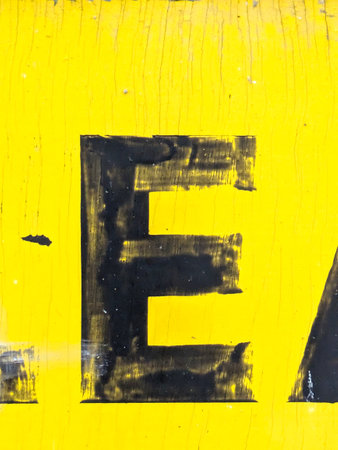 Written Wording in Distressed State Typography Found Ransom Letter E