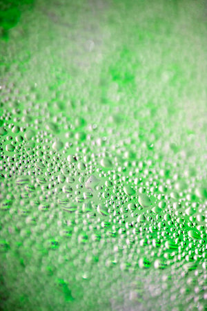 Water Condensation Small Bubbles Moisture on a Glass Window Close up Abstract Backgroundの写真素材