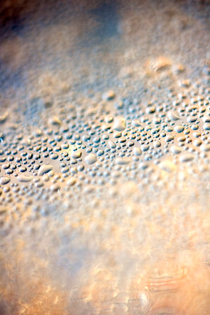 Water Condensation Small Bubbles Moisture on a Glass Window Close up Abstract Backgroundの写真素材