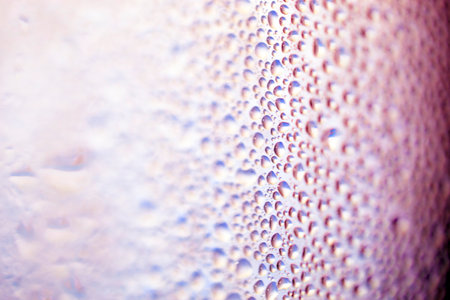 Water Condensation Small Bubbles Moisture on a Glass Window Close up Abstract Backgroundの写真素材