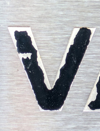 Written Wording in Distressed State Typography Found Ransom Letter V
