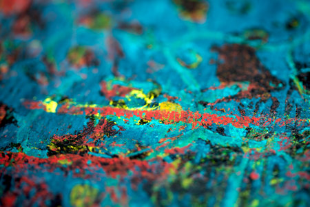 Thick abstract paint surface with heavy texture looking a bit like graffiti hand drawn real dark backgroundの写真素材