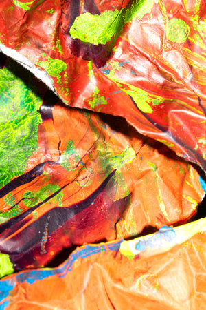 Thick abstract paint surface with heavy texture looking a bit like graffiti hand drawn real orange...