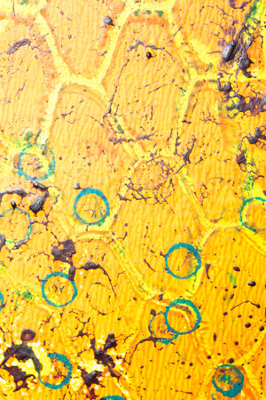 Thick abstract paint surface with heavy texture looking a bit like graffiti hand drawn real yellow...