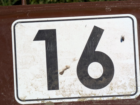 Distressed Typography Displaying the Number 16の写真素材