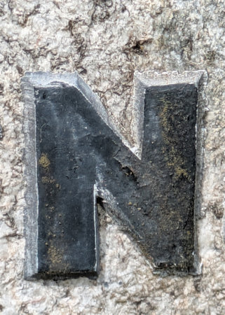 Written Wording in Distressed State Typography Letter N