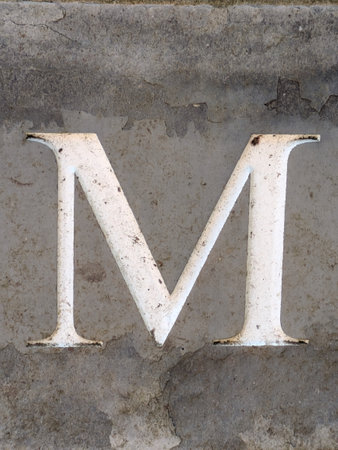 Written Wording in Distressed State Typography Found Ransom Letter M