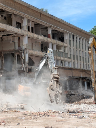 Demolition of Shopping centre Offices by an Industrial Grab Crusher Hydraulic Excavator