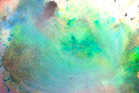 Abstrac Watercolour Vibrant Rainbow Paint Blending Together in a Cloud Shape Backgroundの写真素材