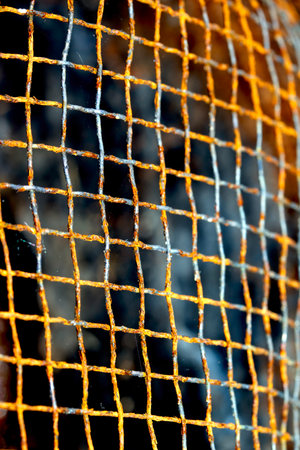 Abstract close up of rusty mesh wire for background