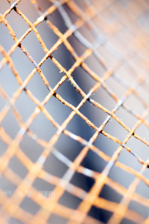 Abstract close up of rusty mesh wire for backgroundの写真素材