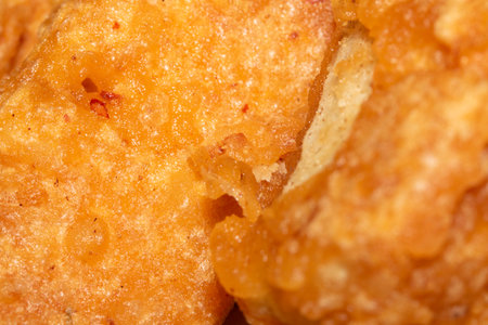 Close up of golden fried chicken or tofu batter cooked