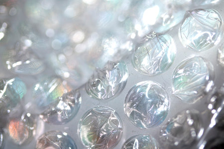 Abstract Bubble Wrap Plastic Circles Shiny Coloured Backgroundの写真素材