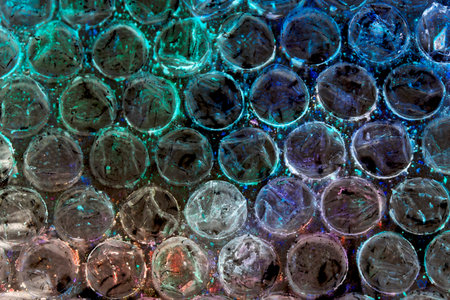 Absract background of shiny plastic and bubbles dreating bright sci-fi style texture backgroundの写真素材
