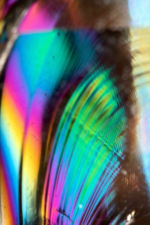 Beautiful close up of quartz crystal rock shard with reflective rainbow Holographic  spiritual lightの写真素材