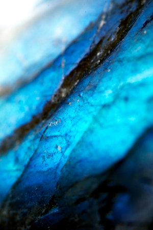 Beautiful close up of quartz crystal rock shard with reflective rainbow spiritual lightの写真素材