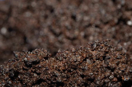Close up of wet grinds that looks like soil or mud background