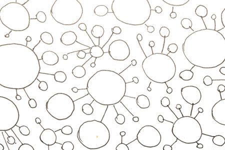 Close up of hand drawn doodle pen circle spirals and spots and dots on white background