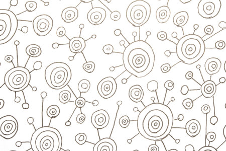 Close up of hand drawn doodle pen circle spirals and spots and dots on white background