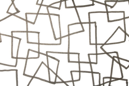 Close up of hand drawn doodle pen triangle square black lines and waves on white background
