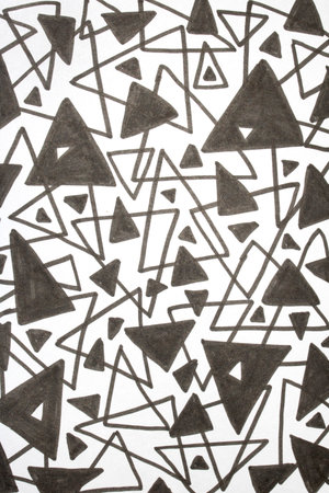 Close up of hand drawn doodle pen triangle square black lines and waves on white backgroundの写真素材