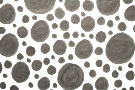 Close up of hand drawn doodle pen circles and spots and dots on white backgroundの写真素材