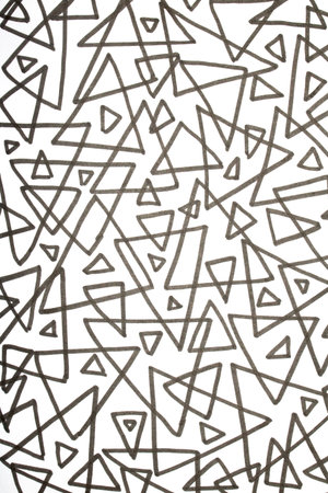 Close up of hand drawn doodle pen triangle square black lines and waves on white backgroundの写真素材