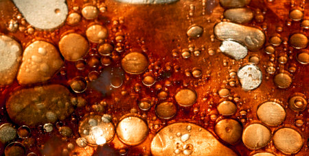 Close up of bubbling oil and fat abstract food backgroundの写真素材