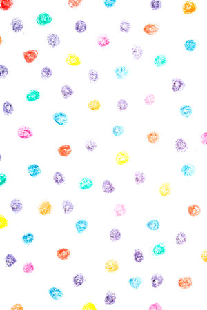 Multicoloured children's pencil crayon spotty polka dots backgroundの写真素材