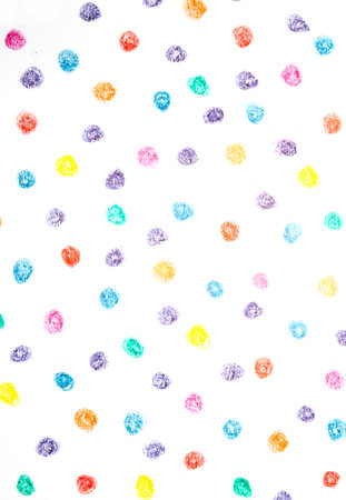 Multicoloured children's pencil crayon spotty polka dots background