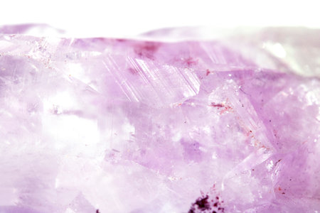 Beautiful close up of quartz crystal rock shard with reflective rainbow spiritual lightの写真素材