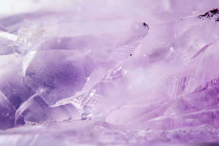 Beautiful close up of quartz crystal rock shard with reflective rainbow spiritual lightの写真素材
