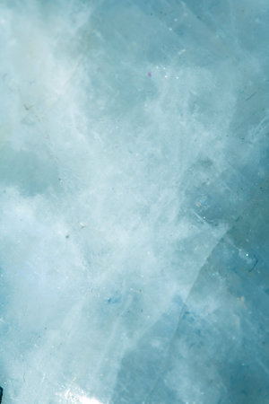 Beautiful close up of quartz crystal rock shard with reflective rainbow spiritual lightの写真素材