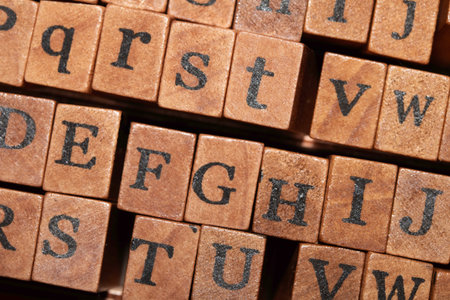 Jumbled up block wood print letters lined upの写真素材