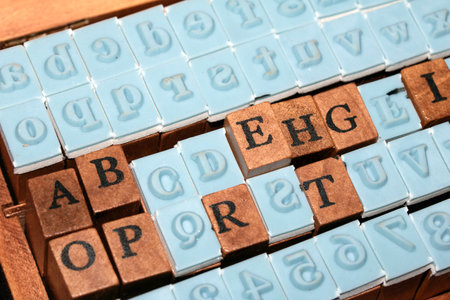 Jumbled up block wood print letters lined upの写真素材